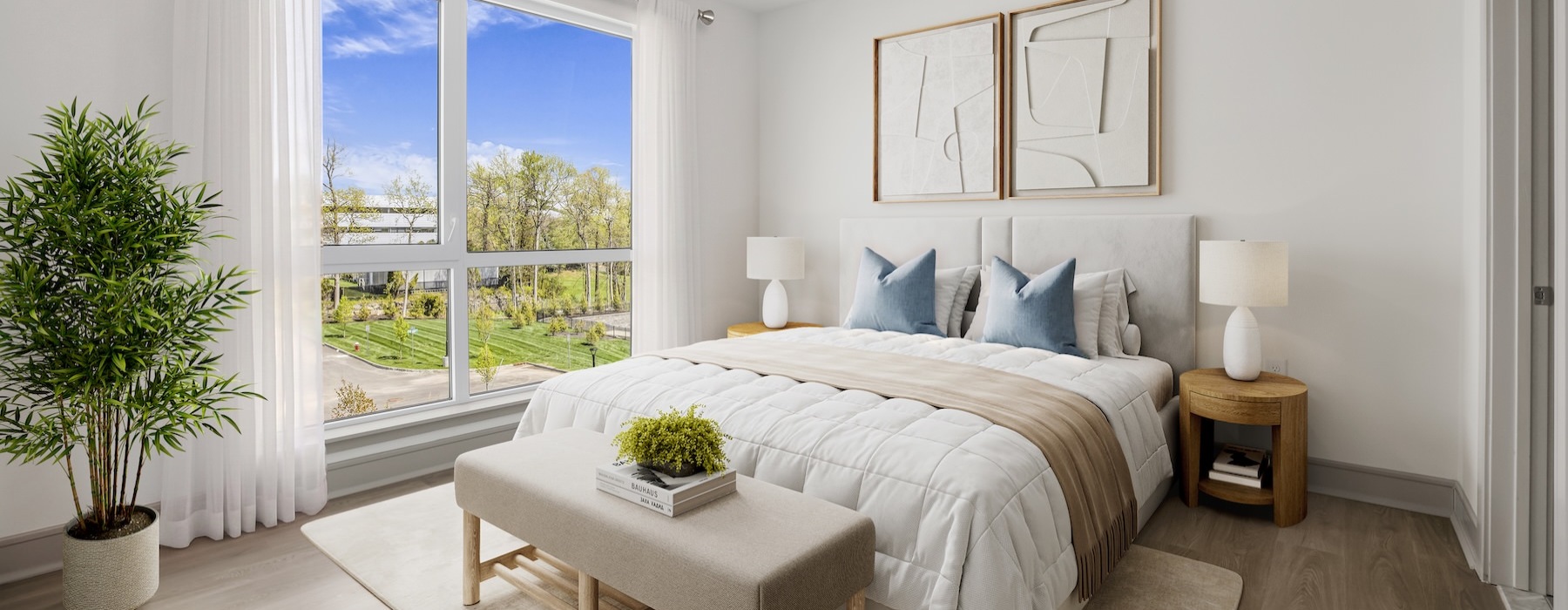 a bedroom with a bed and a bench