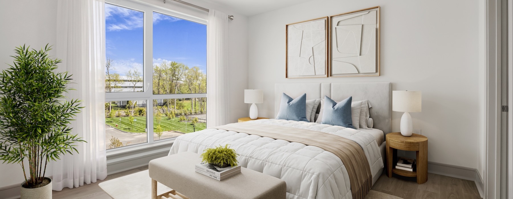 a bedroom with a bed and a bench